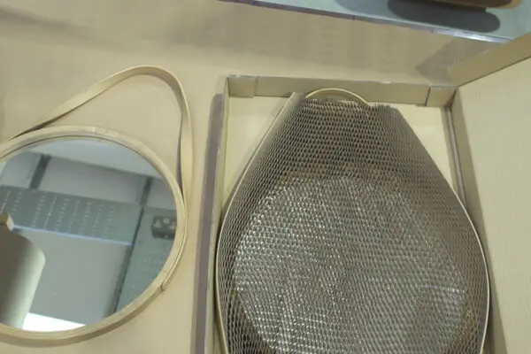 An image of a bespoke hand made steam bent premium wood mirror by Tom Raffield being protected by Flexi-Hex in a box