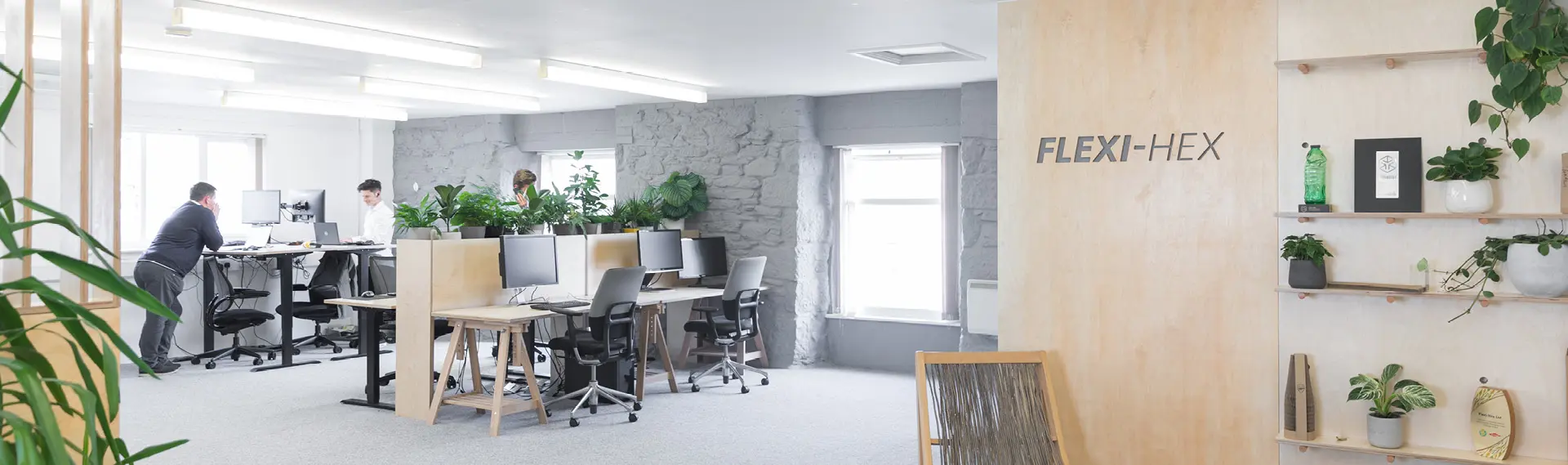 Flexi-Hex open plan head office in Porthleven Cornwall showing trophies, awards and foliage