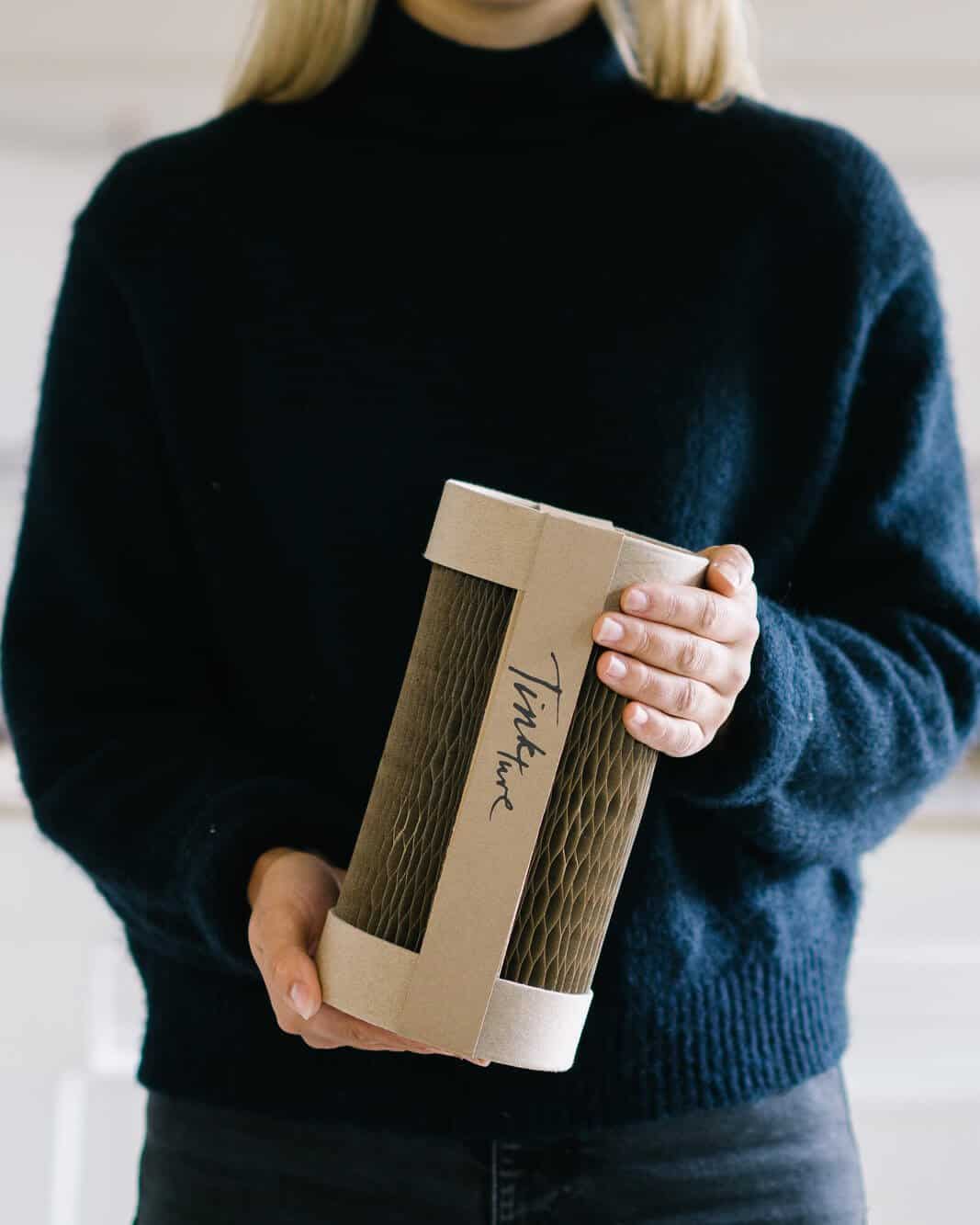 The Drum drinks packaging held in hands