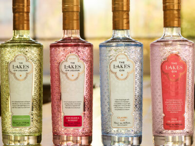 4 bottles of gin by the The Lakes Distillery in green, pink, and blue in elderflower, phubarb and rosehip, pink grapefruit and classic gin.