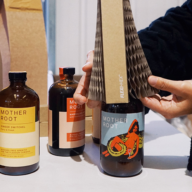 Mother Root bottles being protected by Flexi-Hex
