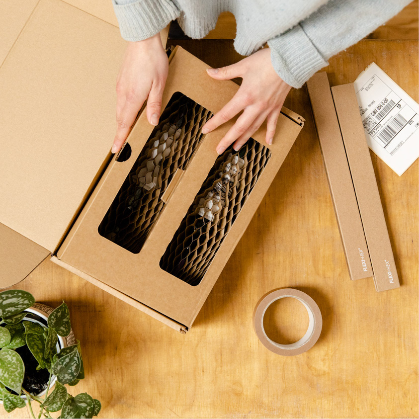 Flexi-Hex sustainable Double Window box packaging being constructed to send fragile items in the post